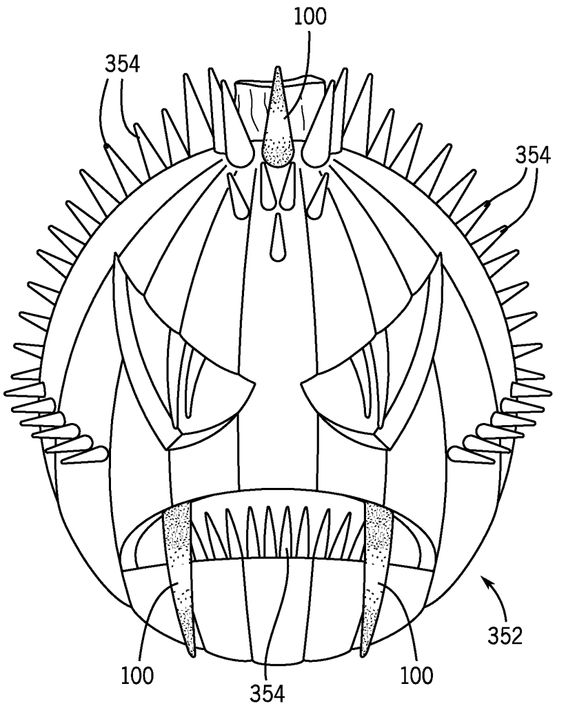 A pumpkin with spikes all over it.